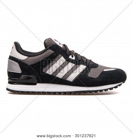Vienna, Austria - August 10, 2017: Adidas Zx 700 Black And Grey Sneaker On White Background.