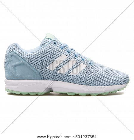 Vienna, Austria - August 10, 2017: Adidas Zx Flux Sky Blue Sneaker On White Background.