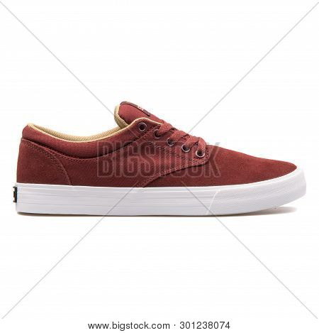 Vienna, Austria - August 10, 2017: Supra Chino Burgundy Sneaker On White Background.