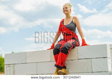 Female Builder Break On Construction Site