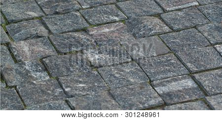 Dark Gray Square Paving Stone From A Rough Uneven Stone