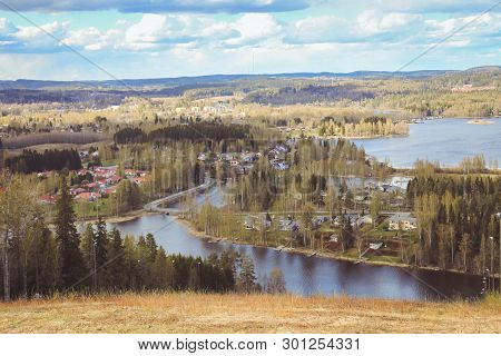 Beautiful Views Of The Mountains To The Lakes, Houses, Birches And Forest. Finnish Landscape. Lakes 