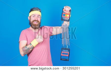 Guide Use Expander Proper Way. Try Stretching Exercise. Athlete Sport Instructor. Athlete Workout Wi