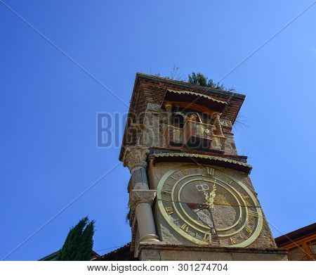 Ancient Falling Clock Tower Of Rezo Gabriadze Puppet Theater In Old Town Of Tbilisi, Georgia.
