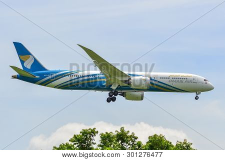 Passenger Airplane Landing At Bangkok Airport