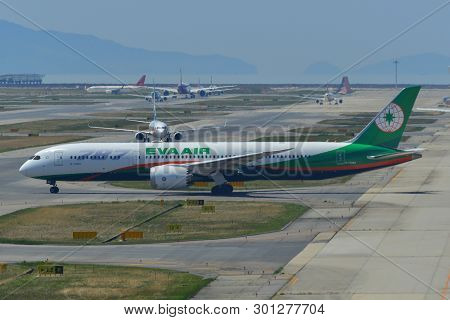 Airplane Taxiing On Runway Of The Airport