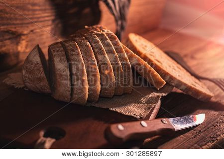 Rural Still Life With Homemade Bread On Rustic Background In The Morning Light