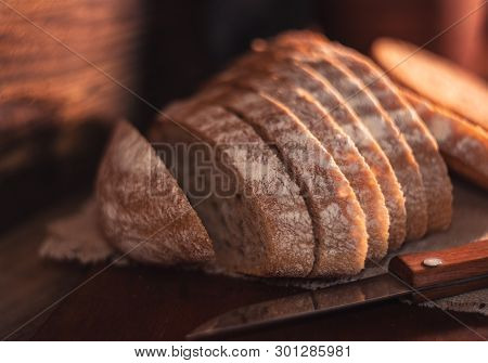 Rural Still Life With Homemade Bread On Rustic Background In The Morning Light