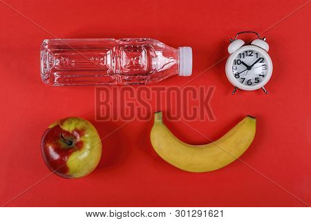 Healthy School Food. Concept: School Food. School Lunch A Bottle Of Pure Water, A Sandwich, An Apple