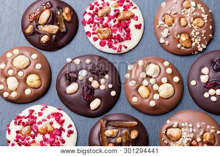 Luxury Handmade Chocolate Mediants, Cookies Bites Candies. Traditional French Dessert. Copy Space. T