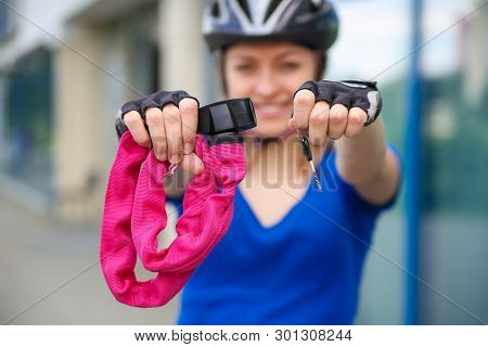Girl With Bicycle  Lock. Bicycle U- Lock