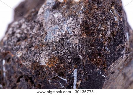 Stone Macro Mineral Ilmenite On A White Background
