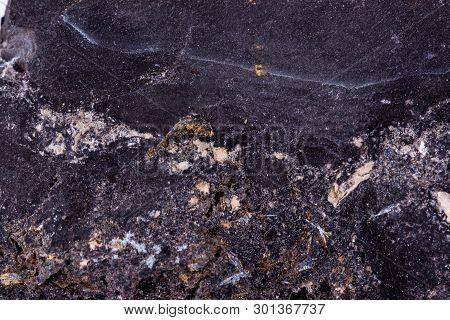 Stone Macro Mineral Ilmenite On A White Background