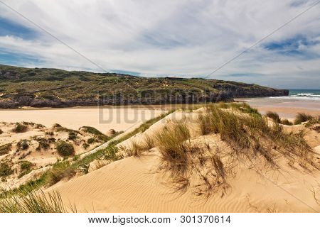 Dunes and sea landscape at the Praia da Amoreira beach in the west Algarve. Portugal