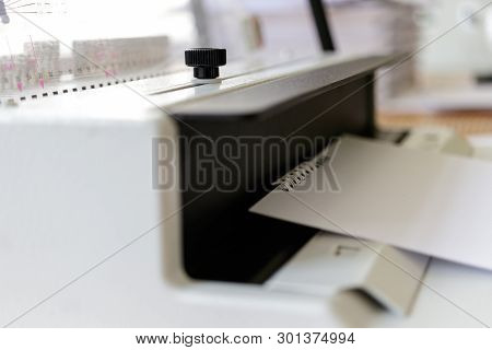 Book Binding Machine.  Work With Book Binding Machine. Printing Equipment.