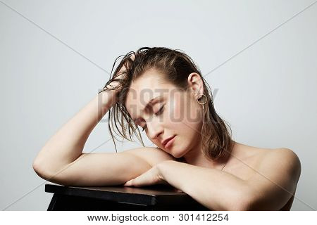 Beauty Portrait Of A Pretty Young Topless Femle With Natural Makeup Over White Background. Cosmetolo