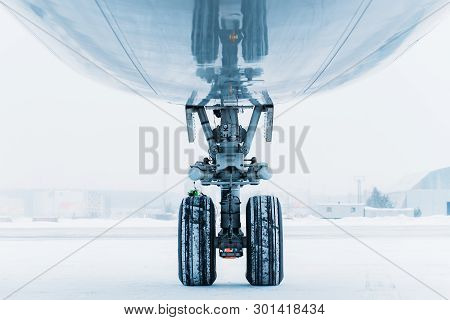 Chassis Cargo Aircraft Boeing 747. Airport In Winter.