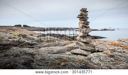 Cairn On A Hiking Trail On The Island Of Yeu, France