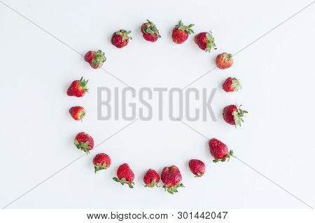 Oval Frame Of Strawberries On White Background. Flat Lay, Top View.