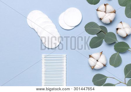 Cotton Cosmetic Makeup Removers Tampons. Spa Concept. Flat Lay Background With Cotton Flowers, Cotto