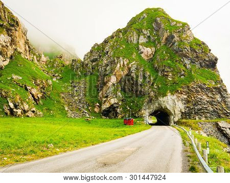 Road With Old Tunnel In Green Summer Mountains, Norway. National Tourist Andoya Route.