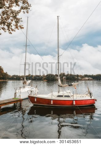Trakai, Lithuania - August 15, 2017:little Yellow Sport Yacht On The Lake Trakai, Lithuania. Beautif