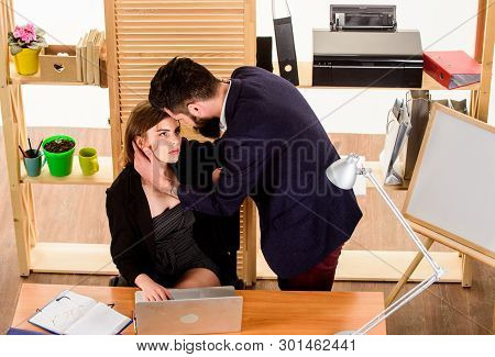 A Little Passion At Work. Love Affair Of Bearded Man And Sexy Woman In Office. Couple In Love Conduc