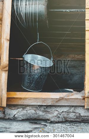 Street Lighting. Well. Metal Bucket And Chain. Well Have Toning