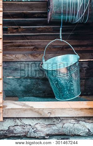 Street Lighting. Well. Metal Bucket And Chain. Well Have Toning