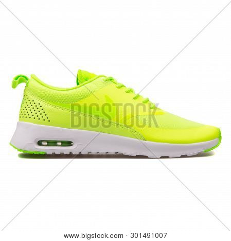 Vienna, Austria - August 10, 2017: Nike Air Max Thea Green Sneaker On White Background.