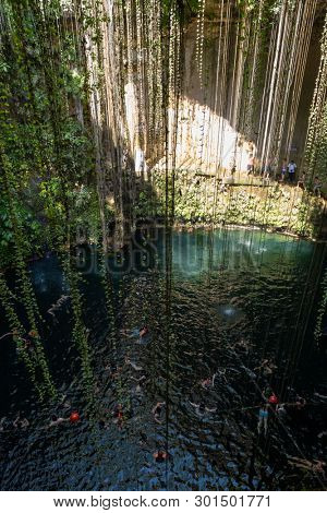 YUCATAN,MEXICO - APRIL 17,2019 : The Ik Kil Cenote near Chichen Itza at the Yucatan Peninsula in Mexico