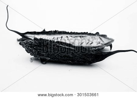 Raw Organic Bitter Melon Or Bitter Cucumber Or Bitter Gourd Isolated On White.