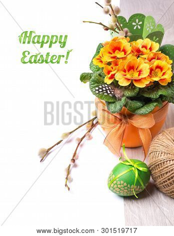 Easter Arragement With Primrose Flowerpot, Pussy Willow And Eggs On Wood, Left Side Isolated On Whit