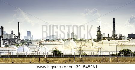 Industeial Power Oil Refineries And Evening Light.