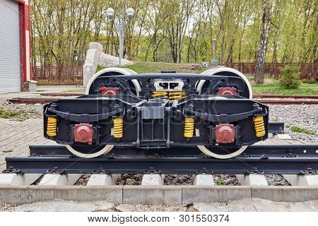 Railway Wheels Narrow Gauge Railway And Ordinary Railway. Freight Cargo Train Or Boxcar Chassis, Sus