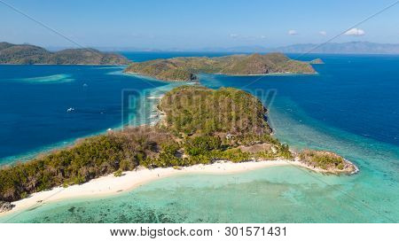 Aerial View Tropical Island With Sand White Beach, Palm Trees. Malcapuya, Philippines, Palawan. Trop