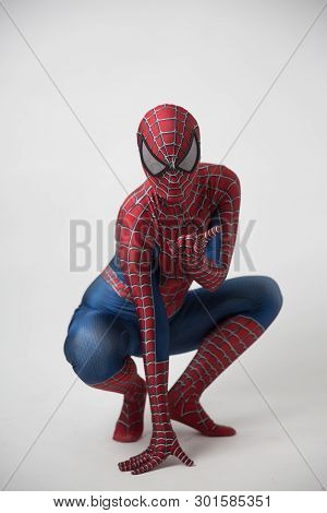 Central, Hong Kong - May 19, 201: Man In Superhero Costume Comic Marvel Spider On Gray Background