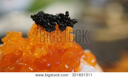 Raw Salmon Toro Top With Salmon Roe( Ikura) And Shrimp Eggs(ebiko) .it Is Japanese Food