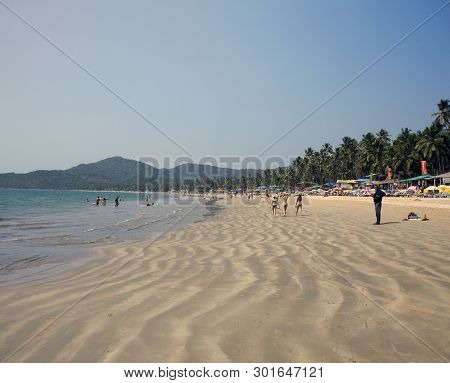 Goa, India - January 31, 2014:vacationers On The Tropical Beach Palolem