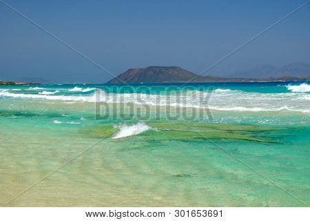 View On The Island Lobos From The Beach Corralejo On The Canary Island Fuerteventura, Spain.