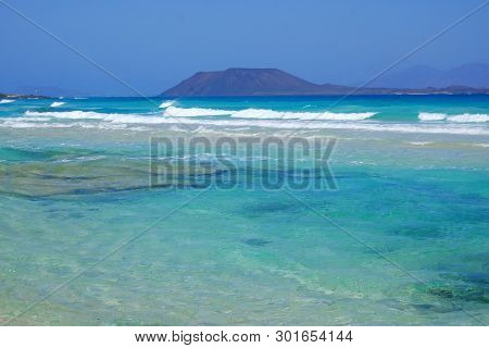 View On The Island Lobos From The Beach Corralejo On The Canary Island Fuerteventura, Spain.