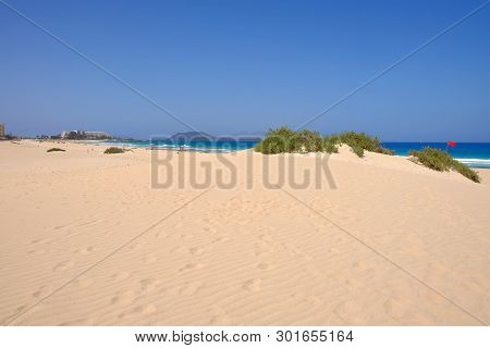 Sand Dunes And Beach In National Park Corralejo, Fuerteventura, Canary Islands, Spain.