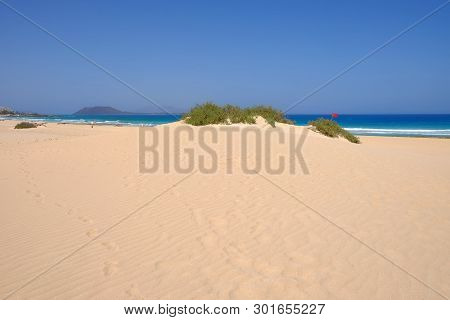 Sand Dunes And Beach In National Park Corralejo, Fuerteventura, Canary Islands, Spain.