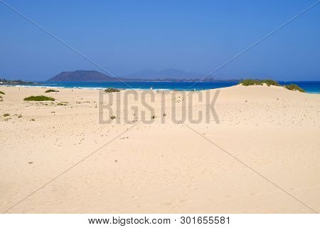 Sand Dunes And Beach In National Park Corralejo, Fuerteventura, Canary Islands, Spain.