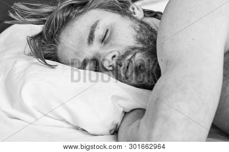 Man Handsome Guy Lay In Bed. Get Adequate And Consistent Amount Of Sleep Every Night. Expert Tips On