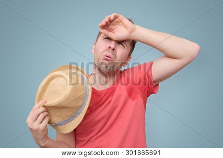 Man Is Worried And Tired Because Of Sweating Stain