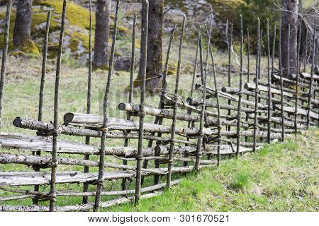 Traditional Old Swedish Wooden Fence At Tyresta Nationalpark, Sweden
