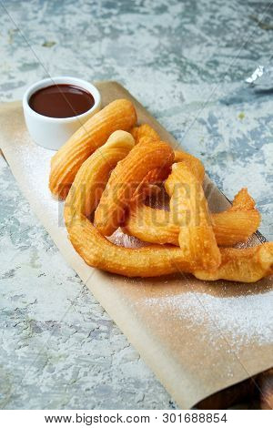 Churos Spanish Dessert. Gray Textured Background. Beautiful Serving Dishes. Dessert. Food Chain