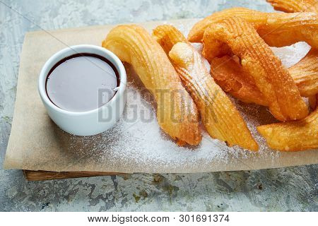 Churos Spanish Dessert. Gray Textured Background. Beautiful Serving Dishes. Dessert. Food Chain