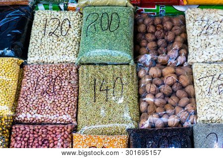 Nuts, Dry Fruits And Pulses Packed In Clear Plastic Bags With Prices